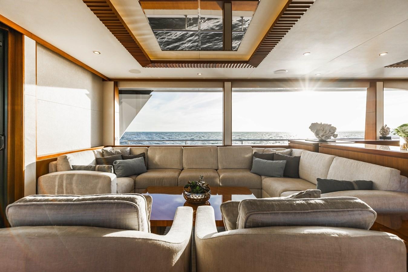 a living room with a large window aboard SEE WORTHY Yacht for Sale