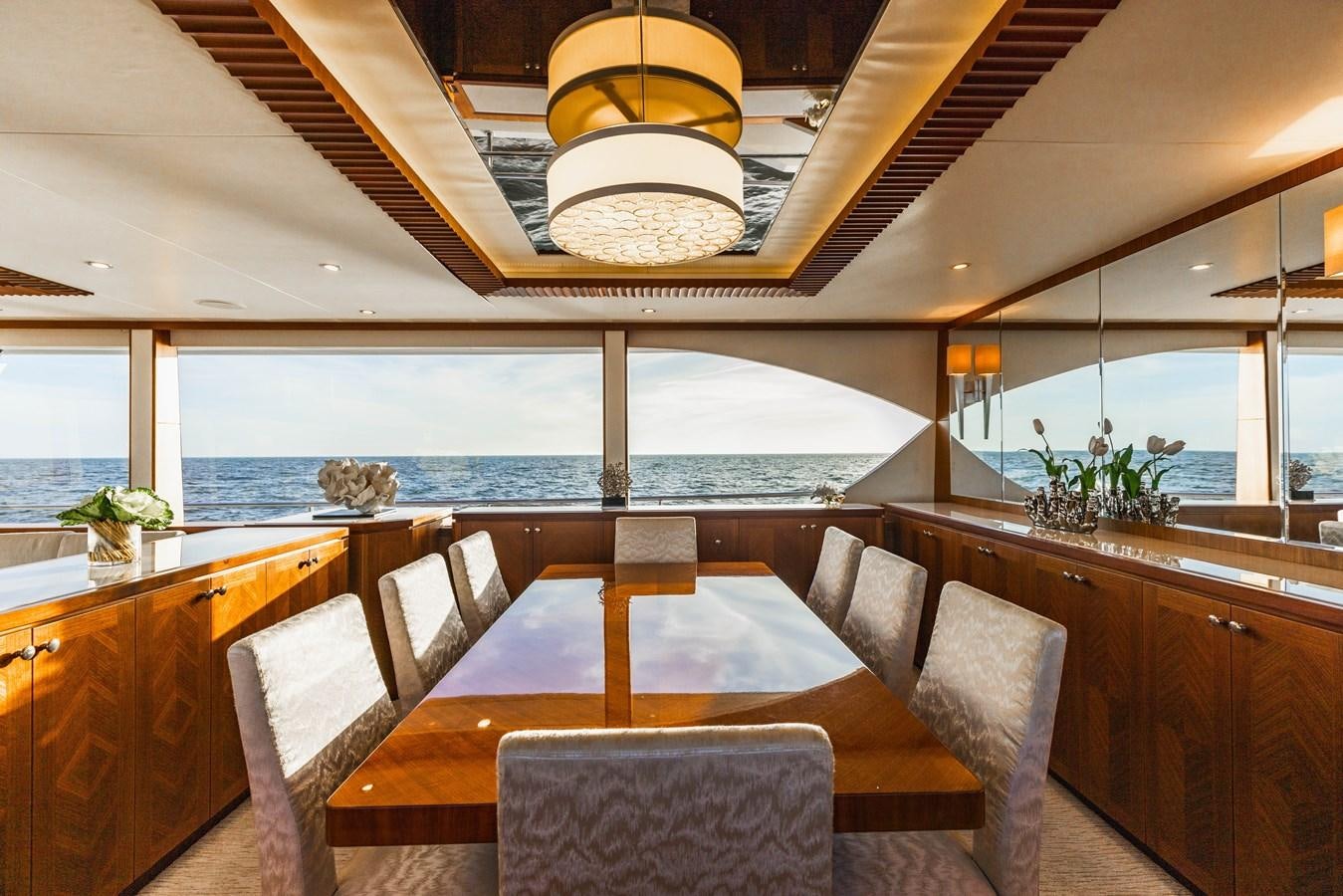 a room with a table and chairs aboard SEE WORTHY Yacht for Sale