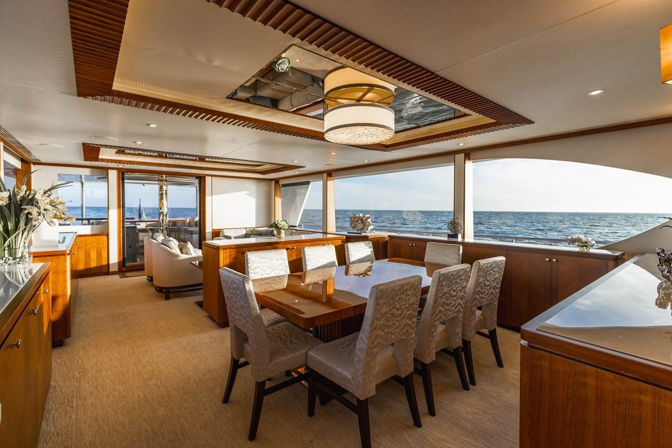 a room with a table and chairs aboard SEE WORTHY Yacht for Sale