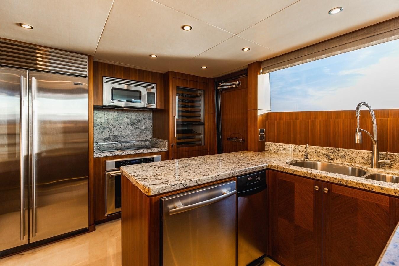 a kitchen with stainless steel appliances aboard SEE WORTHY Yacht for Sale