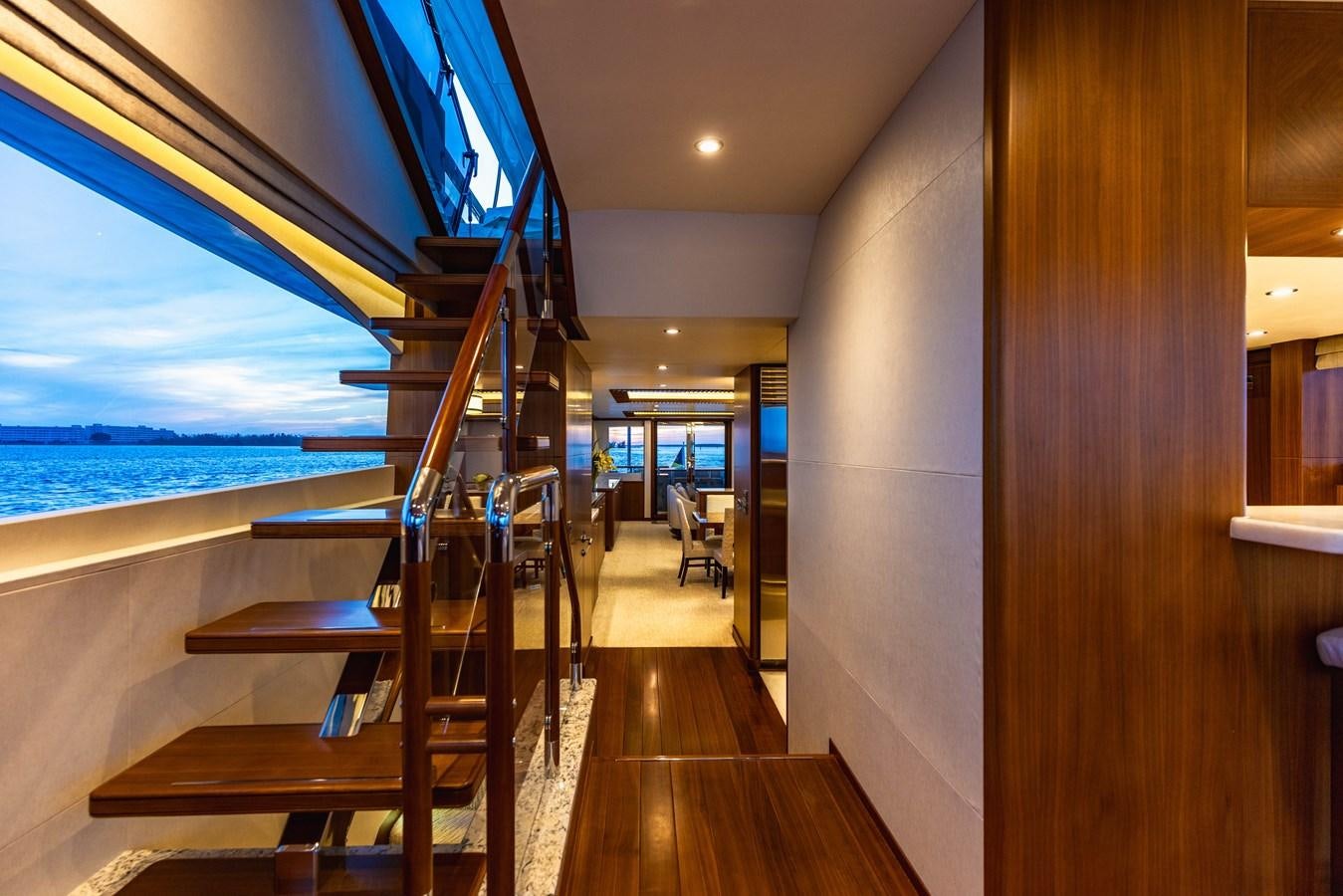 a wood staircase leading to a beach aboard SEE WORTHY Yacht for Sale