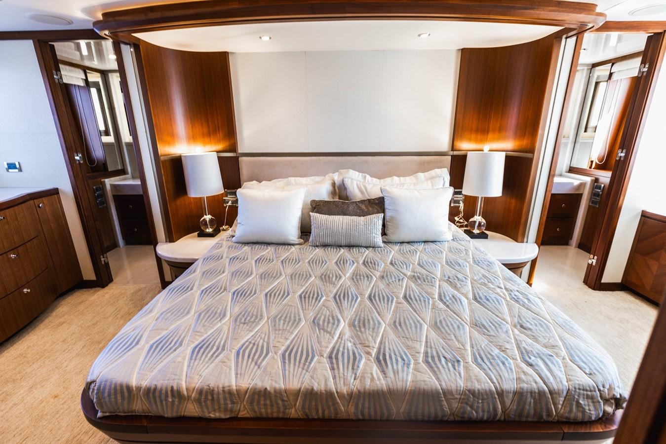 a large bed with white pillows aboard SEE WORTHY Yacht for Sale