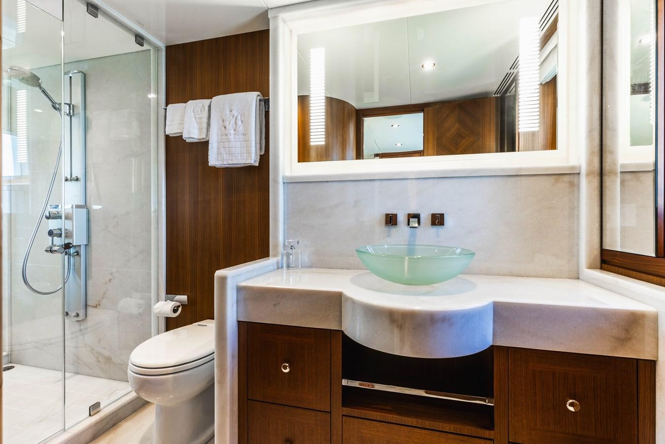 a bathroom with a glass shower aboard SEE WORTHY Yacht for Sale