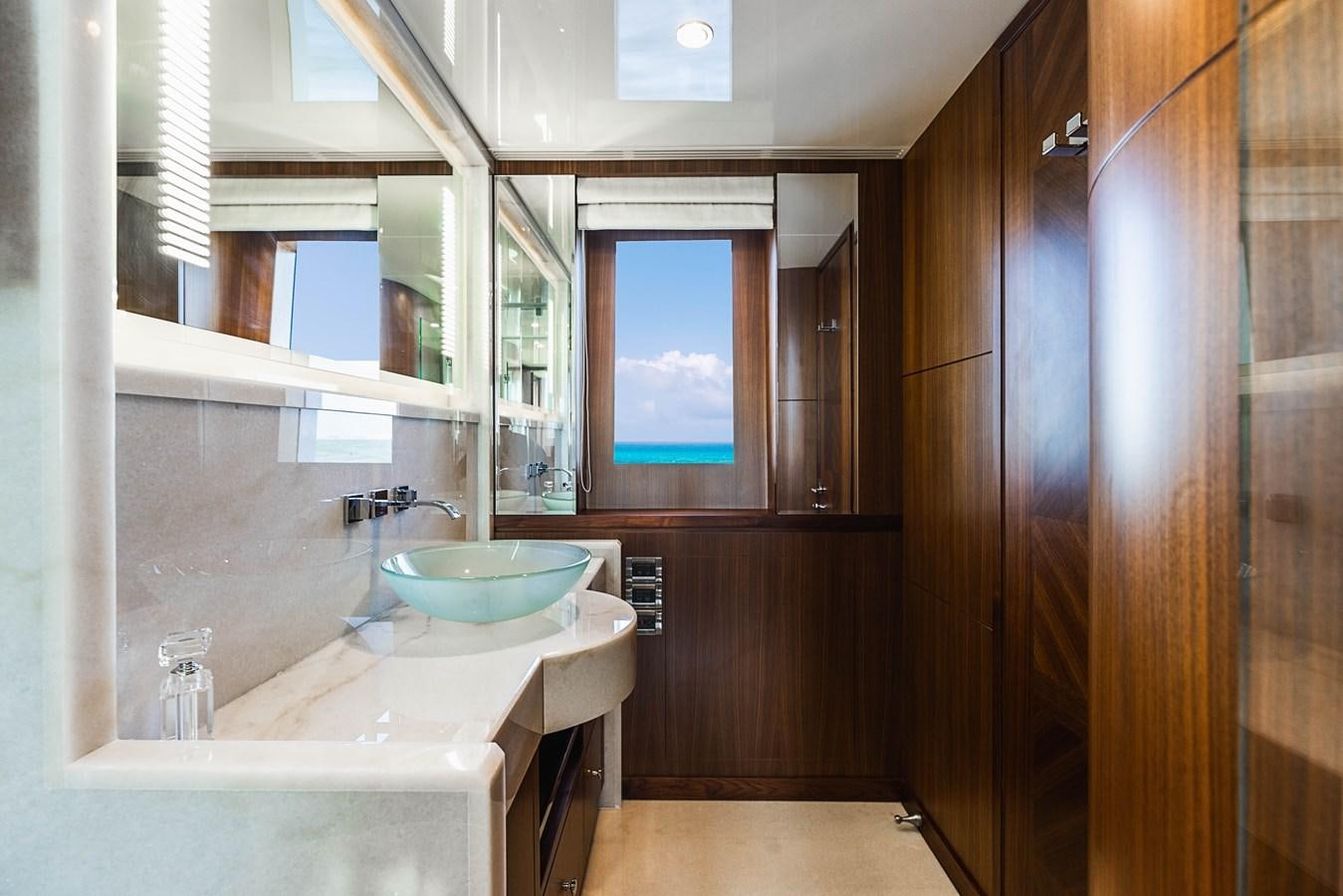 a bathroom with a sink and cabinets aboard SEE WORTHY Yacht for Sale