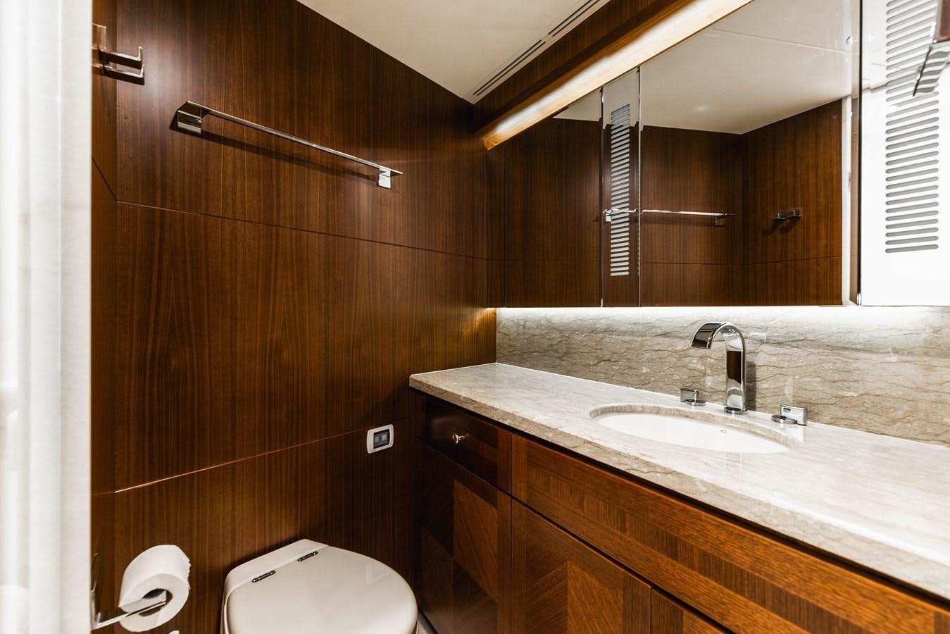 a bathroom with a sink and a mirror aboard SEE WORTHY Yacht for Sale