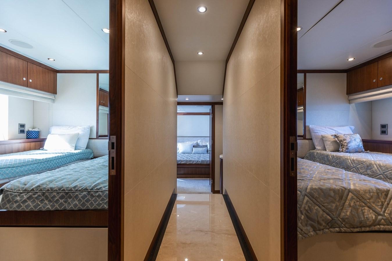 a room with a bed and a door aboard SEE WORTHY Yacht for Sale