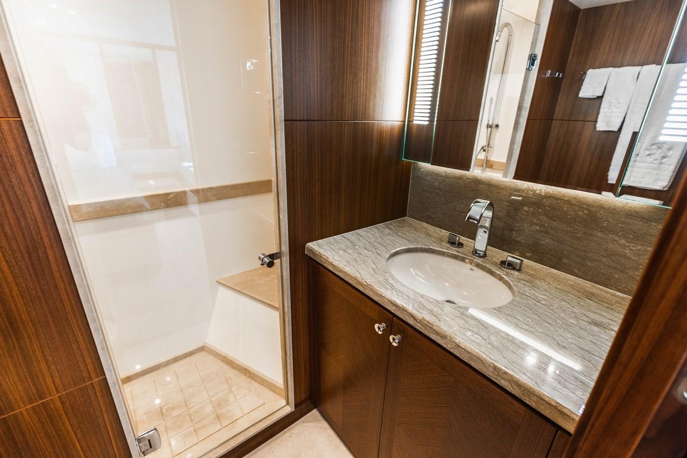 a bathroom with a sink and a mirror aboard SEE WORTHY Yacht for Sale