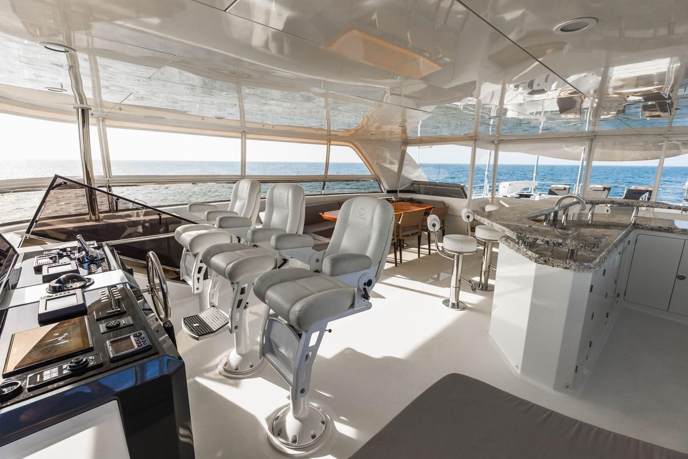 a room with chairs and tables aboard SEE WORTHY Yacht for Sale