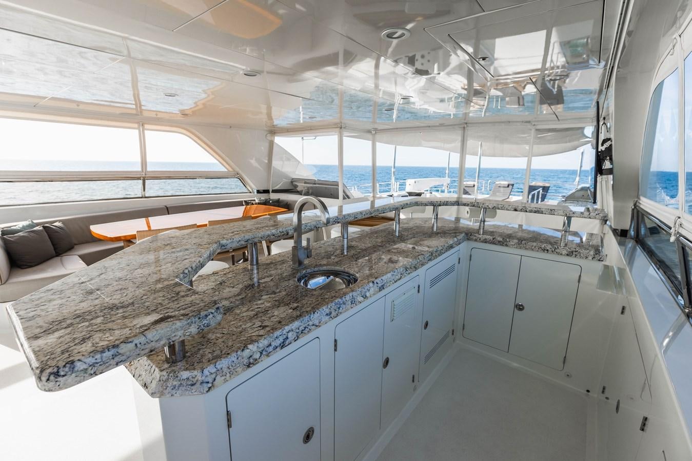 a large kitchen with a large window aboard SEE WORTHY Yacht for Sale