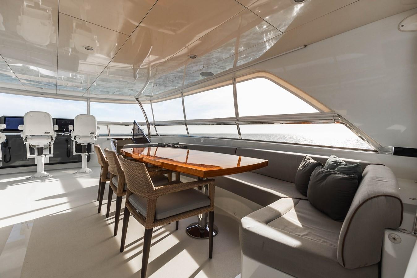 a room with a couch and a table and chairs aboard SEE WORTHY Yacht for Sale
