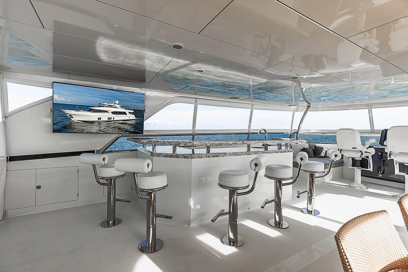 a room with chairs and tables aboard SEE WORTHY Yacht for Sale