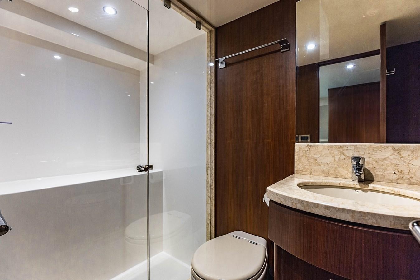 a bathroom with a shower and sink aboard SEE WORTHY Yacht for Sale