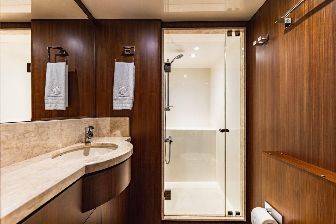 a bathroom with a bathtub and sink aboard SEE WORTHY Yacht for Sale