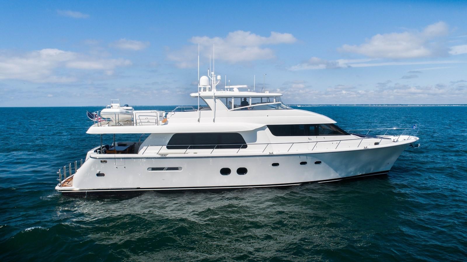 a white yacht in the water aboard TRANQUILITY Yacht for Sale