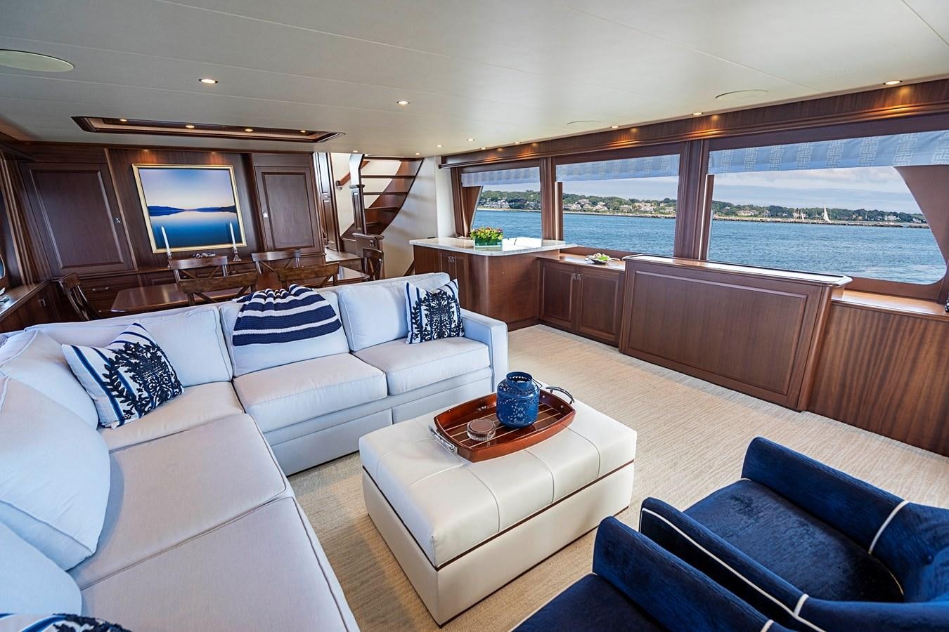 a living room with a large window aboard TRANQUILITY Yacht for Sale