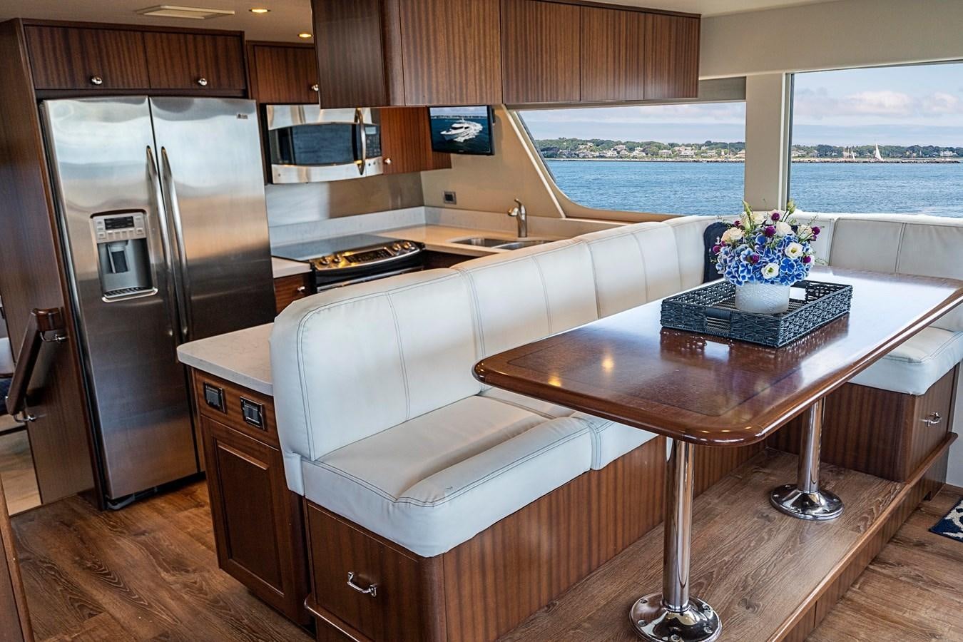 a kitchen with a large island aboard TRANQUILITY Yacht for Sale