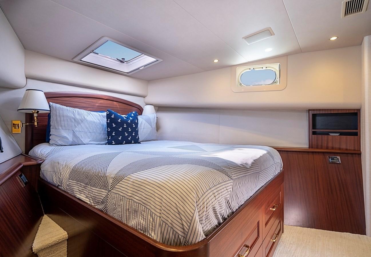 a bed in a room aboard TRANQUILITY Yacht for Sale