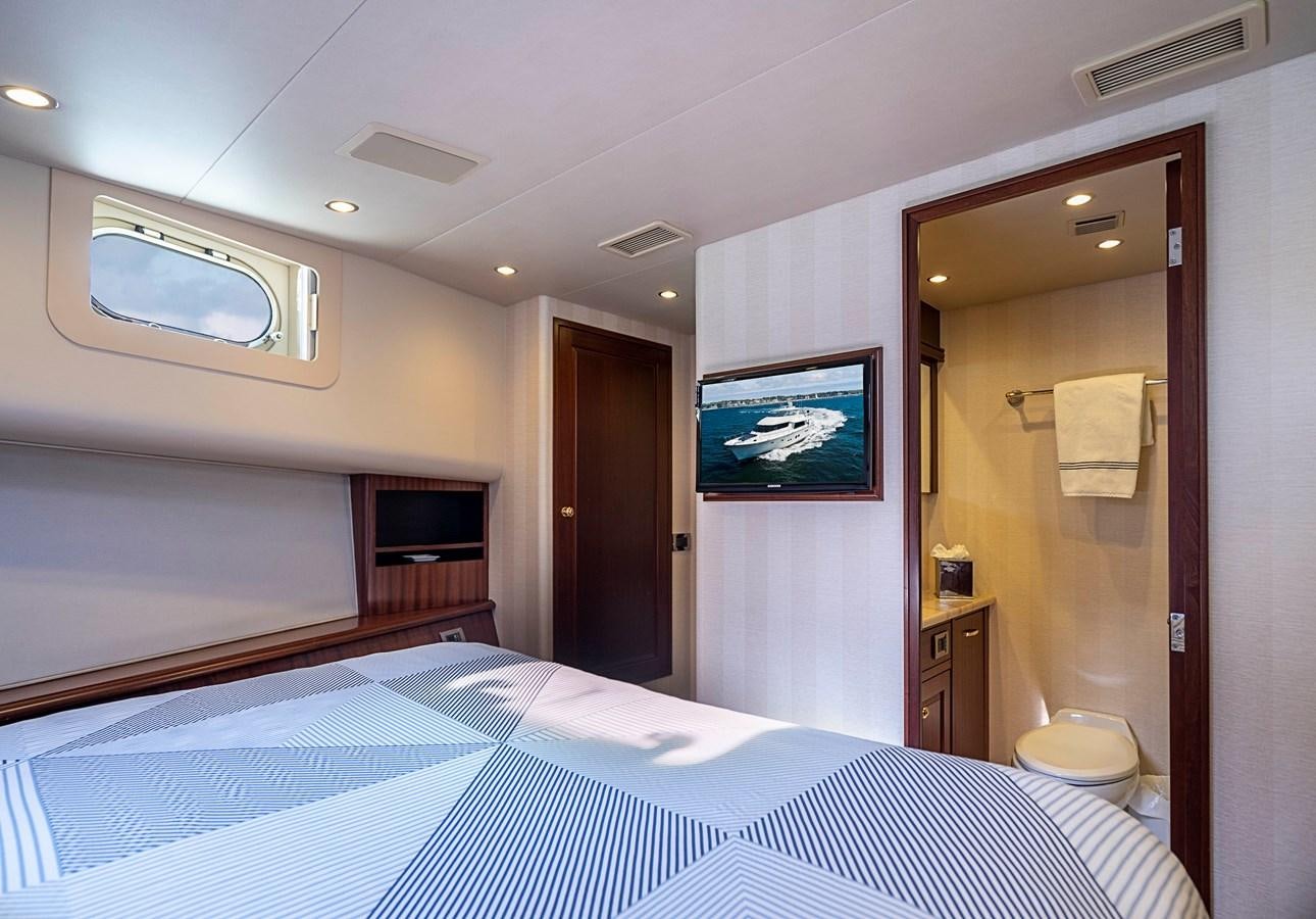 a hotel room with a large mirror aboard TRANQUILITY Yacht for Sale