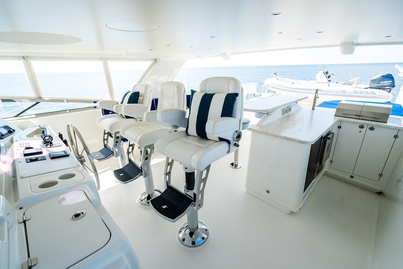 an airplane cockpit with chairs aboard TRANQUILITY Yacht for Sale