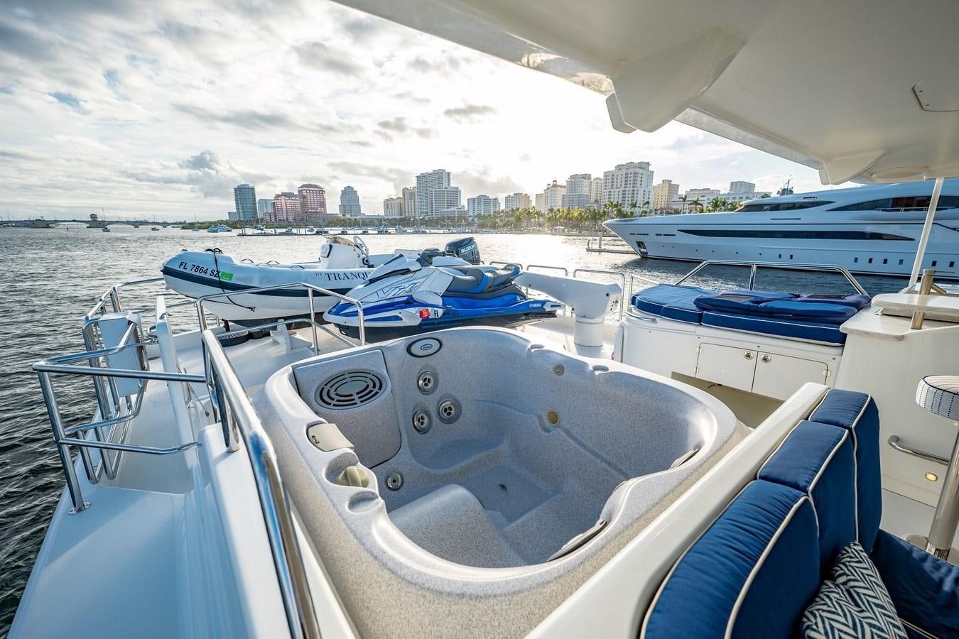 a group of boats sit on a dock aboard TRANQUILITY Yacht for Sale