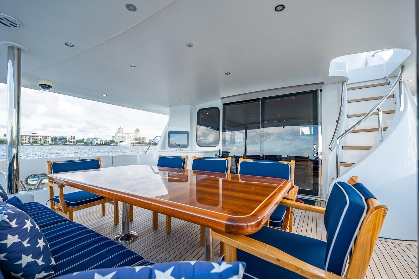 a boat with a table and chairs aboard TRANQUILITY Yacht for Sale