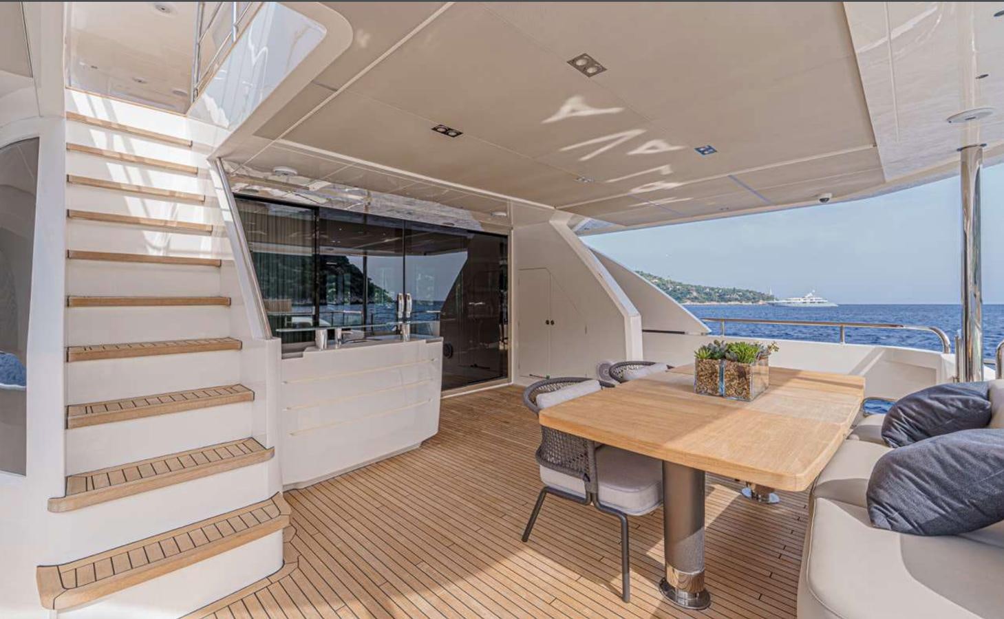 a room with a table and chairs aboard PRINCESS 35M AVALON Yacht for Sale