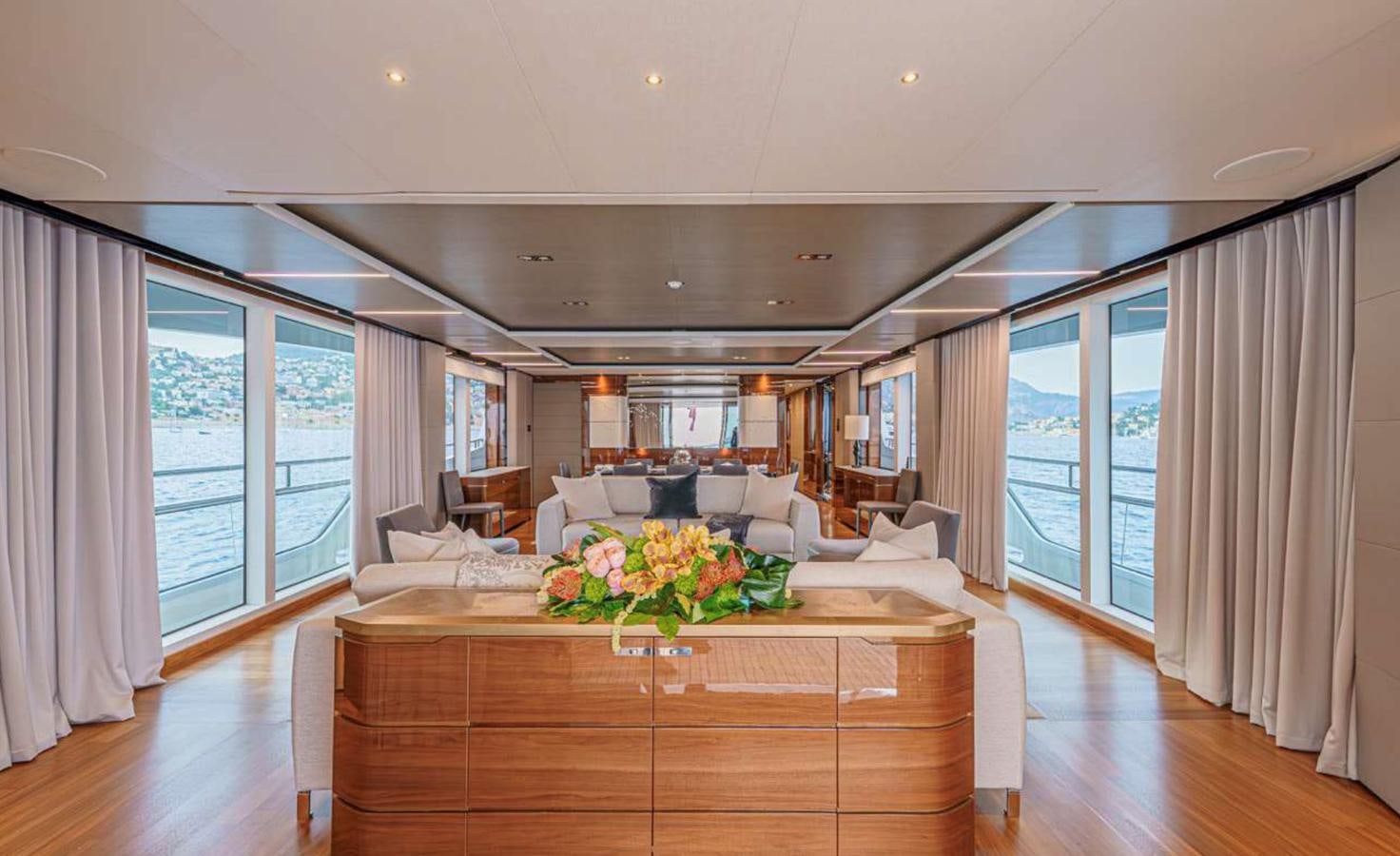 a large living room with a large window aboard PRINCESS 35M AVALON Yacht for Sale