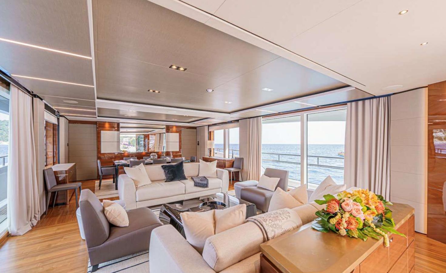a living room with a large window aboard PRINCESS 35M AVALON Yacht for Sale
