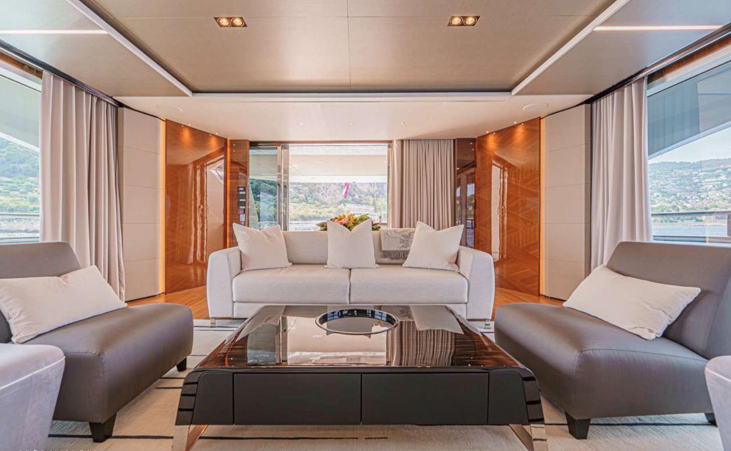 a living room with a large window aboard PRINCESS 35M AVALON Yacht for Sale
