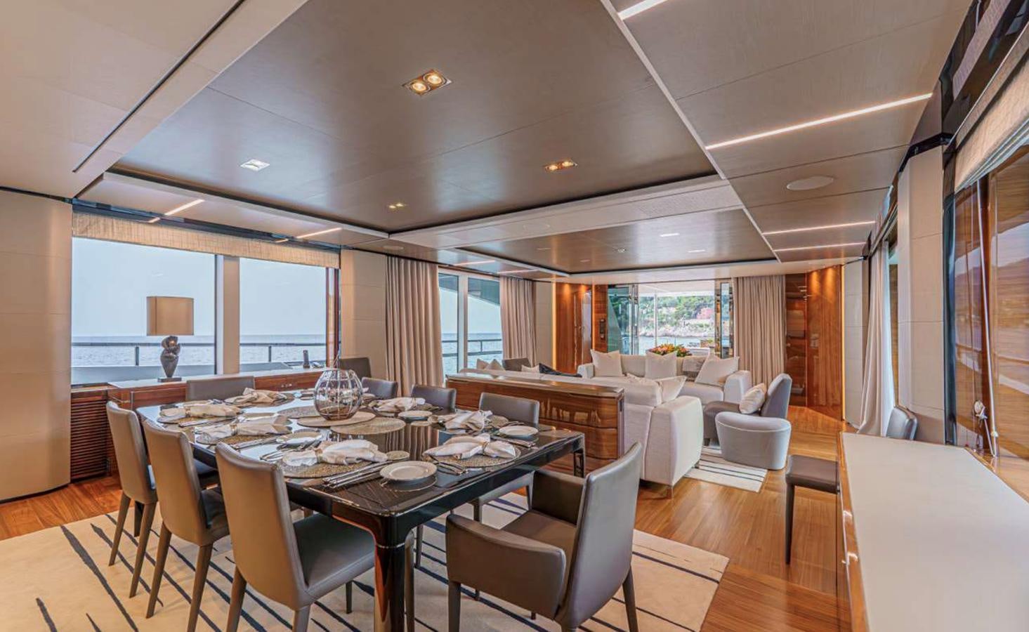 a large dining room with a large table and chairs aboard PRINCESS 35M AVALON Yacht for Sale