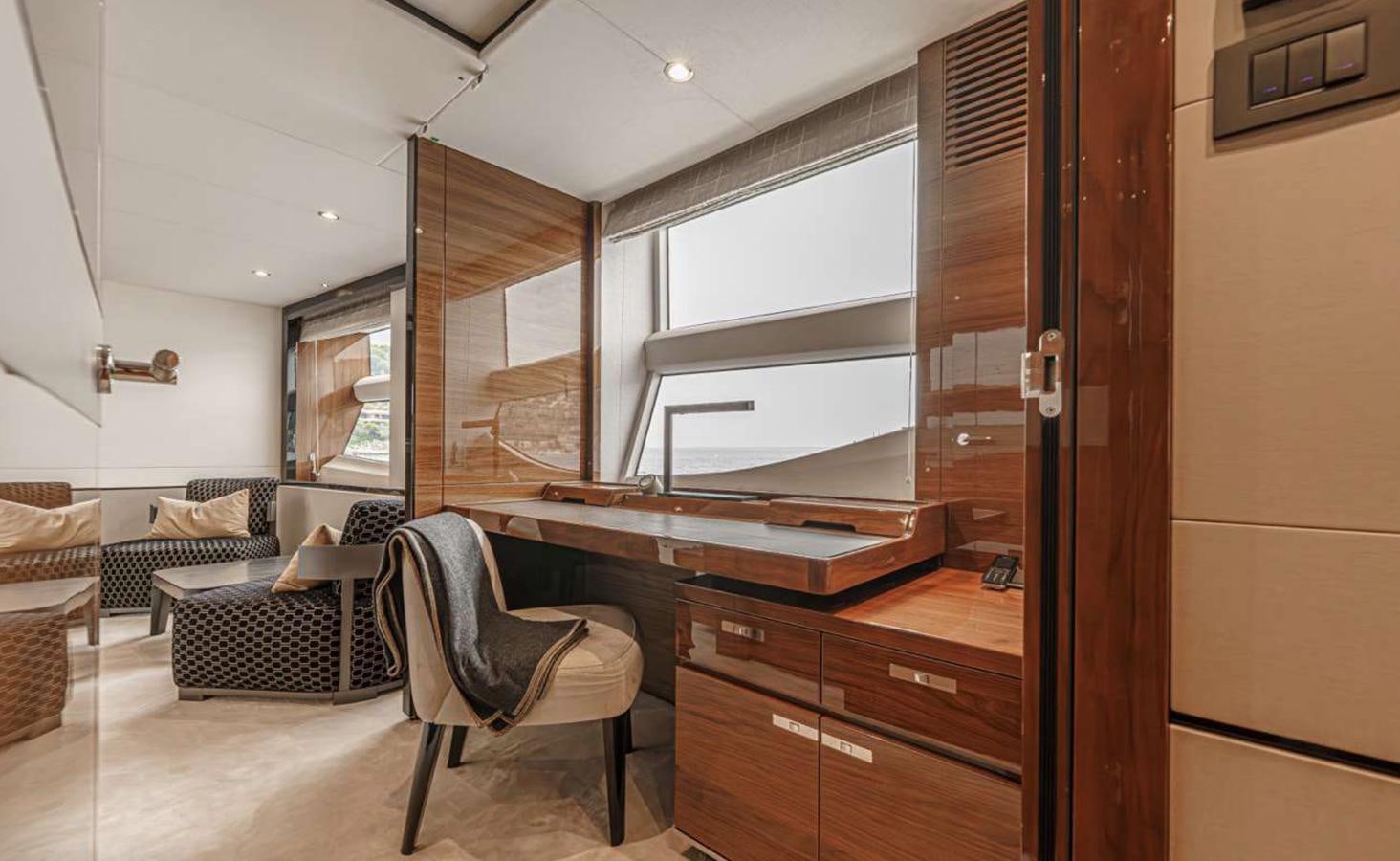 a room with a chair and a desk aboard PRINCESS 35M AVALON Yacht for Sale
