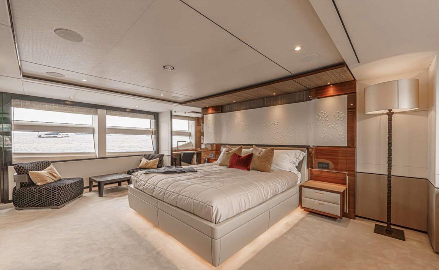 a large bedroom with a large bed aboard PRINCESS 35M AVALON Yacht for Sale