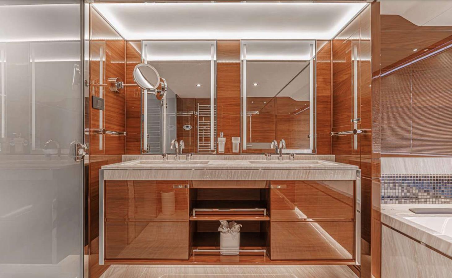 a bathroom with a large mirror aboard PRINCESS 35M AVALON Yacht for Sale