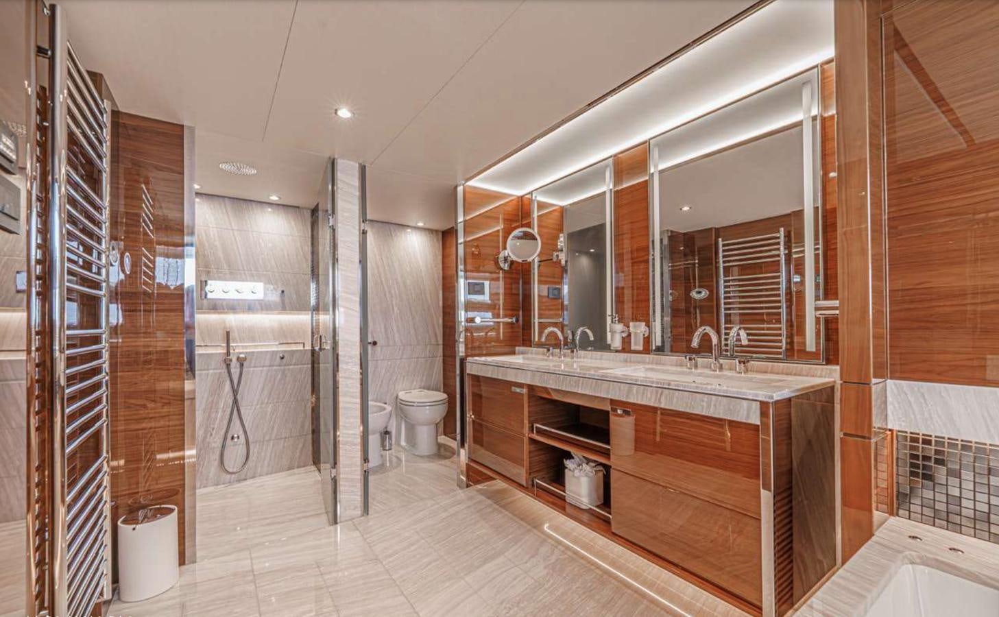a bathroom with a large mirror aboard PRINCESS 35M AVALON Yacht for Sale