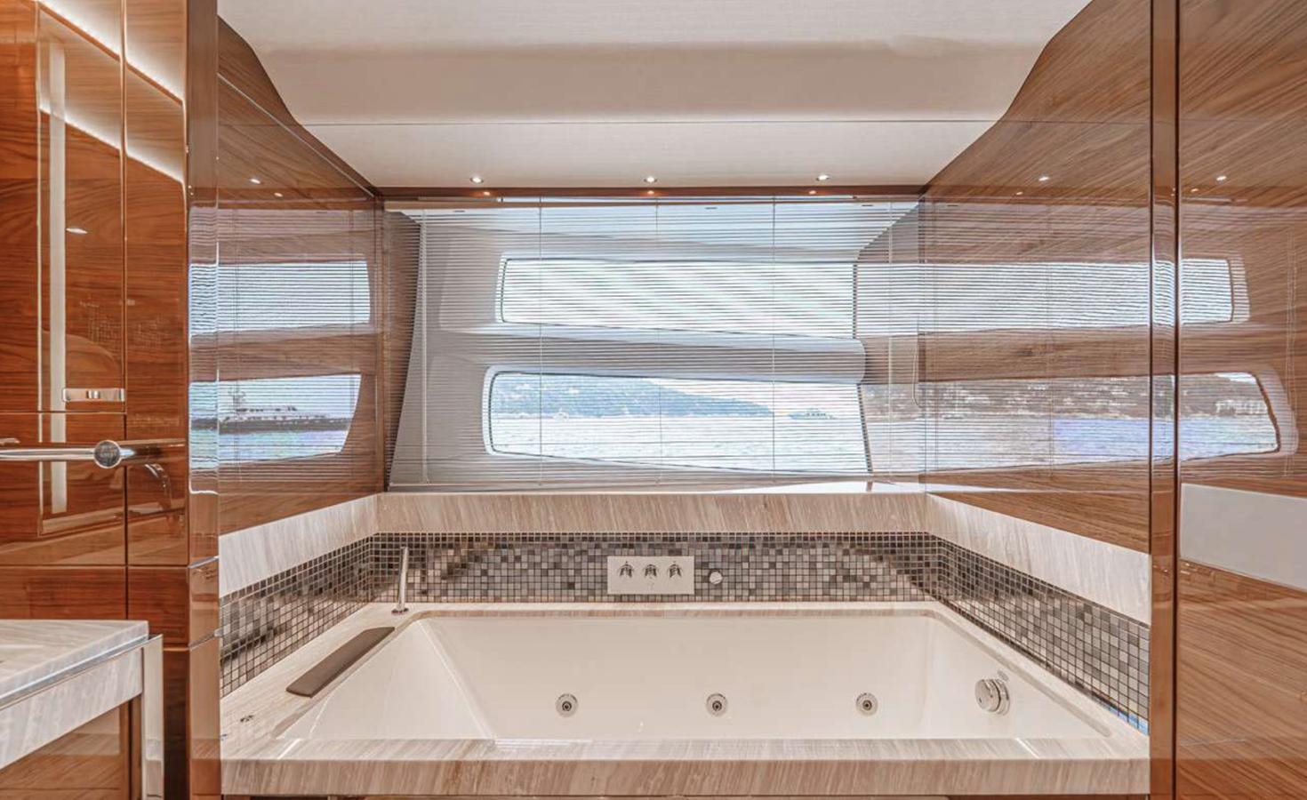 a bathroom with a large tub aboard PRINCESS 35M AVALON Yacht for Sale