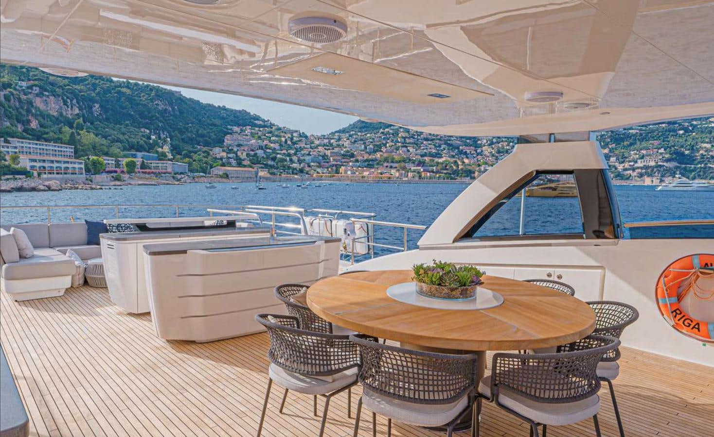 a room with a table and chairs aboard PRINCESS 35M AVALON Yacht for Sale