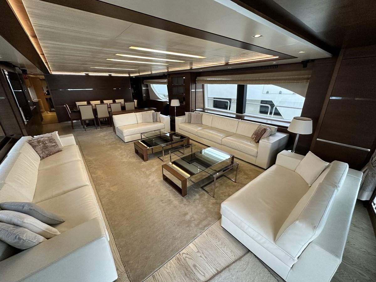 a living room with a large window aboard AZIMUT GRANDE 116 Yacht for Sale