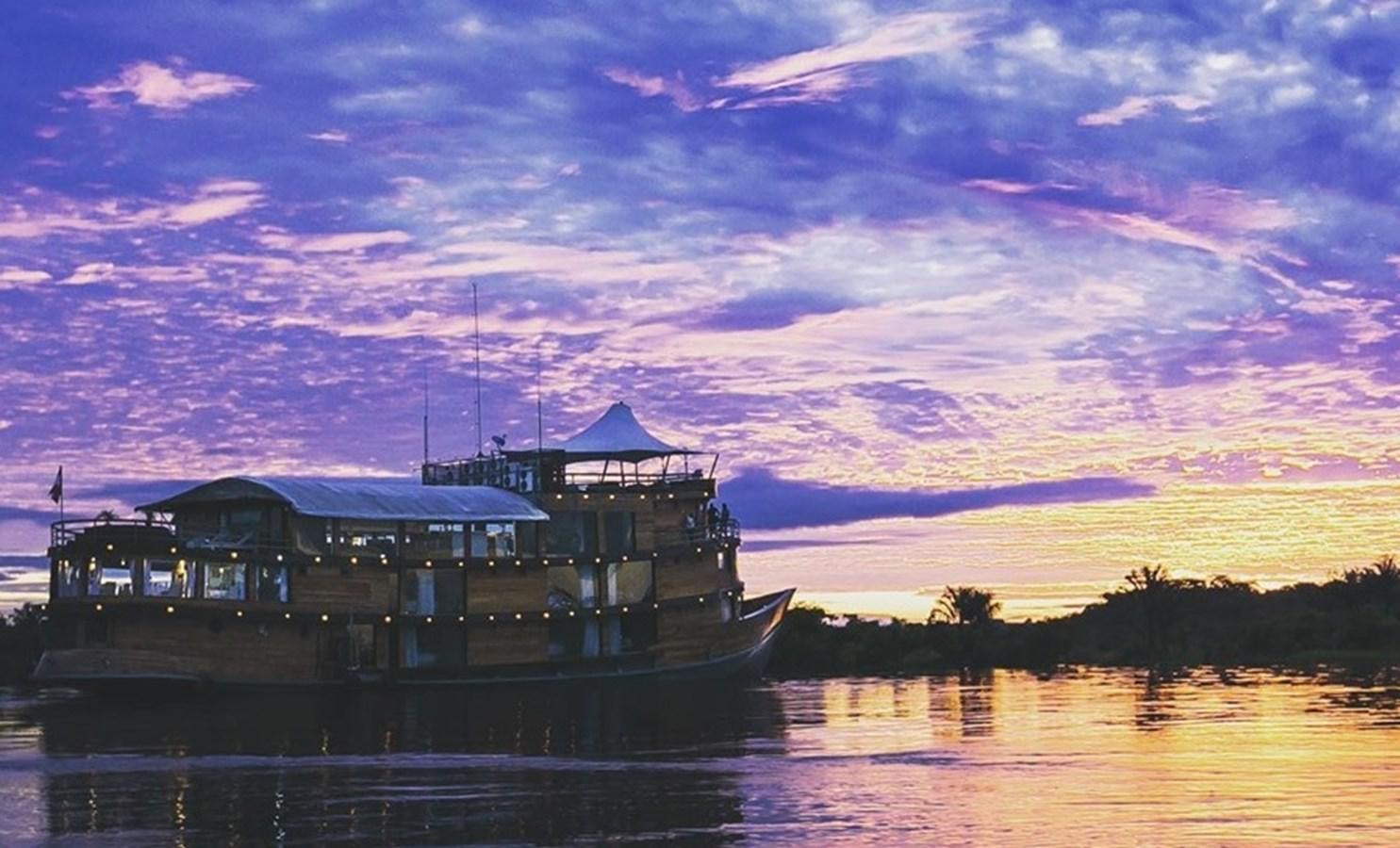 a boat on the water aboard CRUCERO AMAZONAS Yacht for Sale