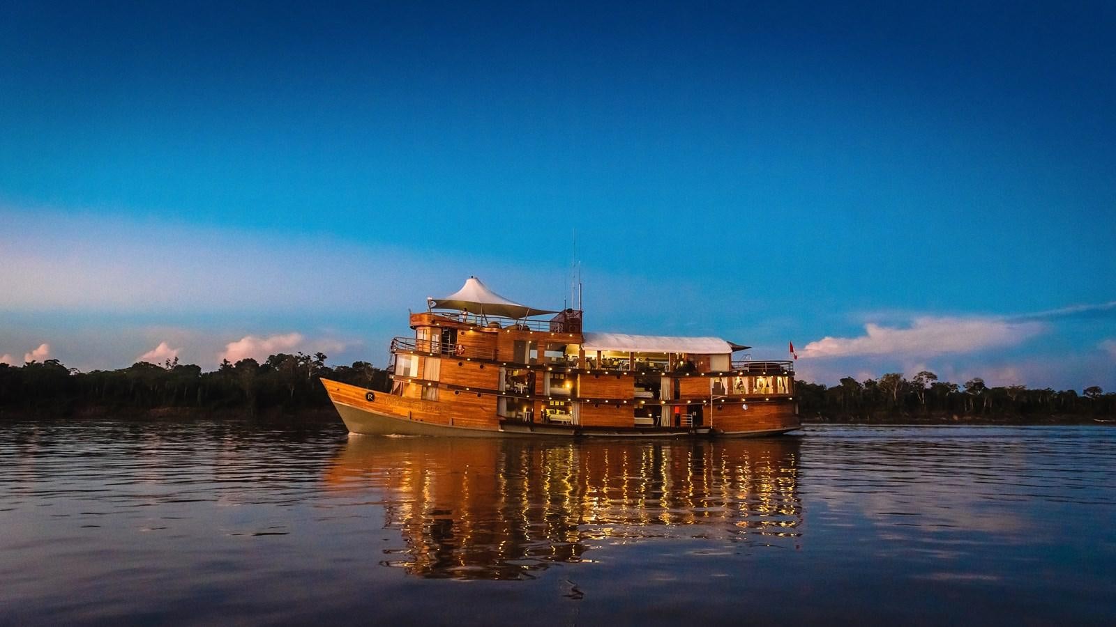 a building on a body of water aboard CRUCERO AMAZONAS Yacht for Sale