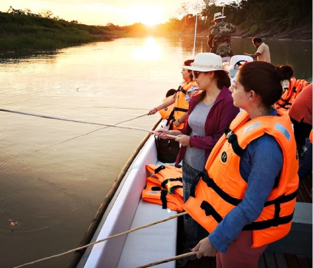 a group of people on a boat aboard CRUCERO AMAZONAS Yacht for Sale