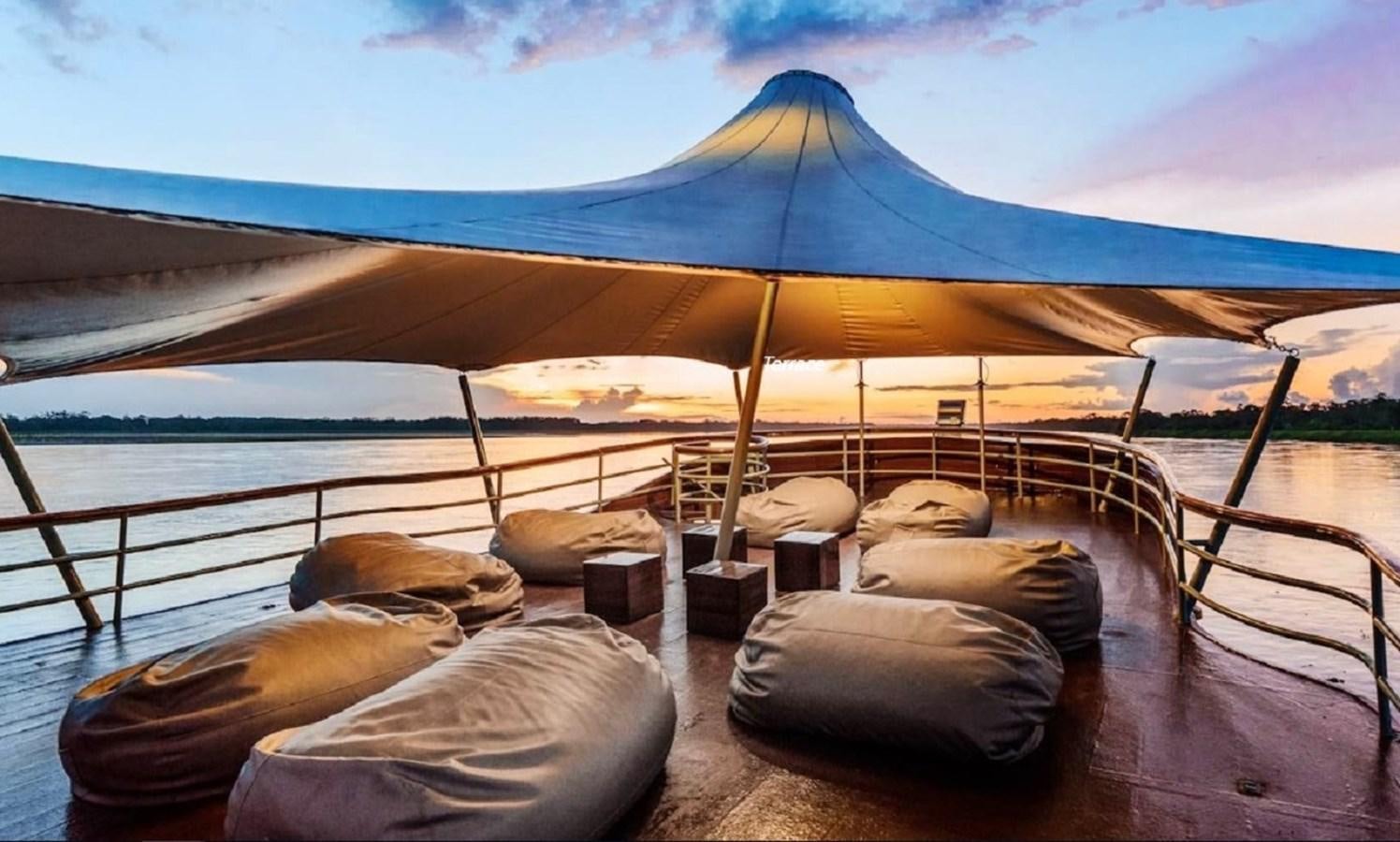 a tent on a deck aboard CRUCERO AMAZONAS Yacht for Sale