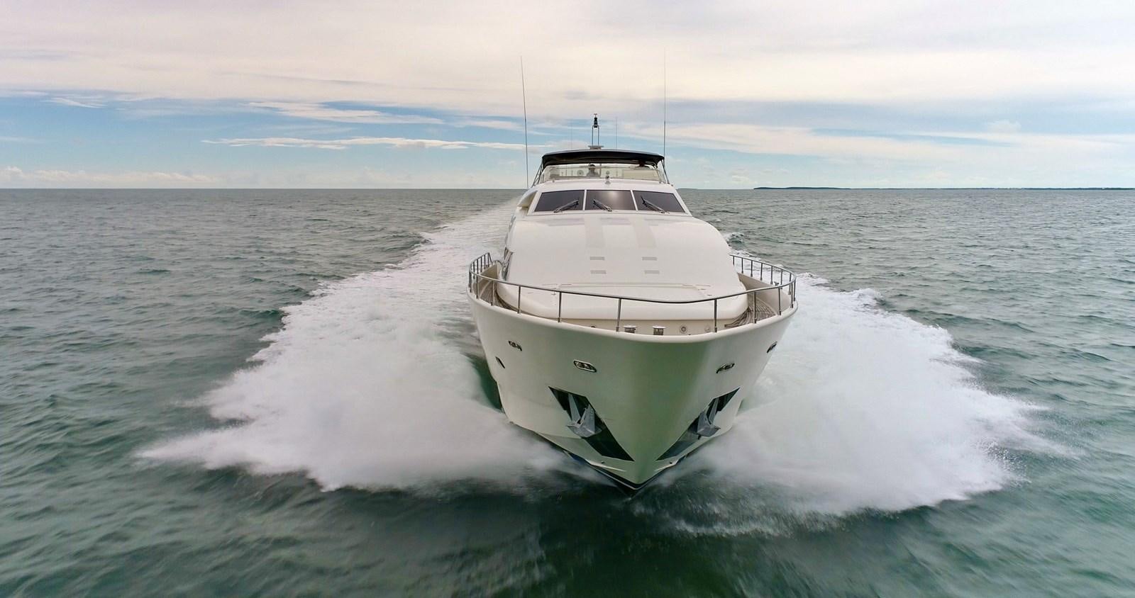 a white boat on the water aboard EVERYTHING GOOD Yacht for Sale