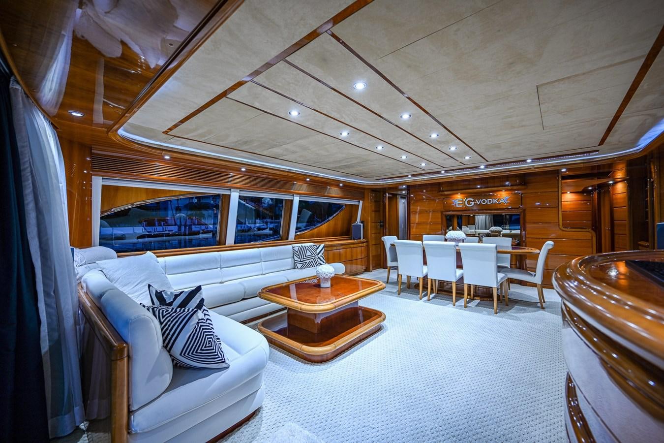 a room with a couch and a table and chairs aboard EVERYTHING GOOD Yacht for Sale