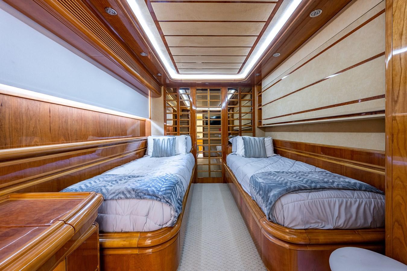 a room with bunk beds aboard EVERYTHING GOOD Yacht for Sale