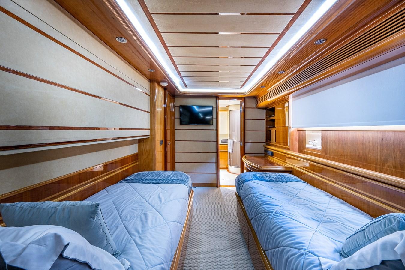 a room with bunk beds aboard EVERYTHING GOOD Yacht for Sale