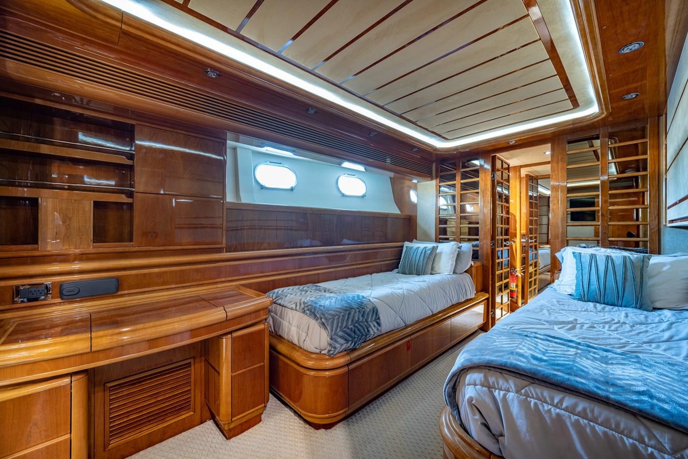 a room with bunk beds aboard EVERYTHING GOOD Yacht for Sale
