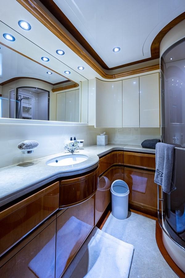a bathroom with a sink and a toilet aboard EVERYTHING GOOD Yacht for Sale