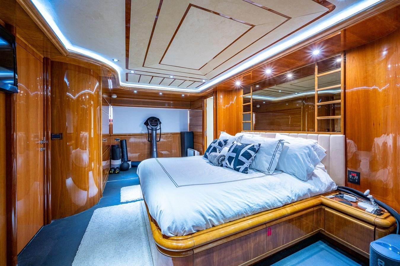 a room with a bed and a desk aboard EVERYTHING GOOD Yacht for Sale