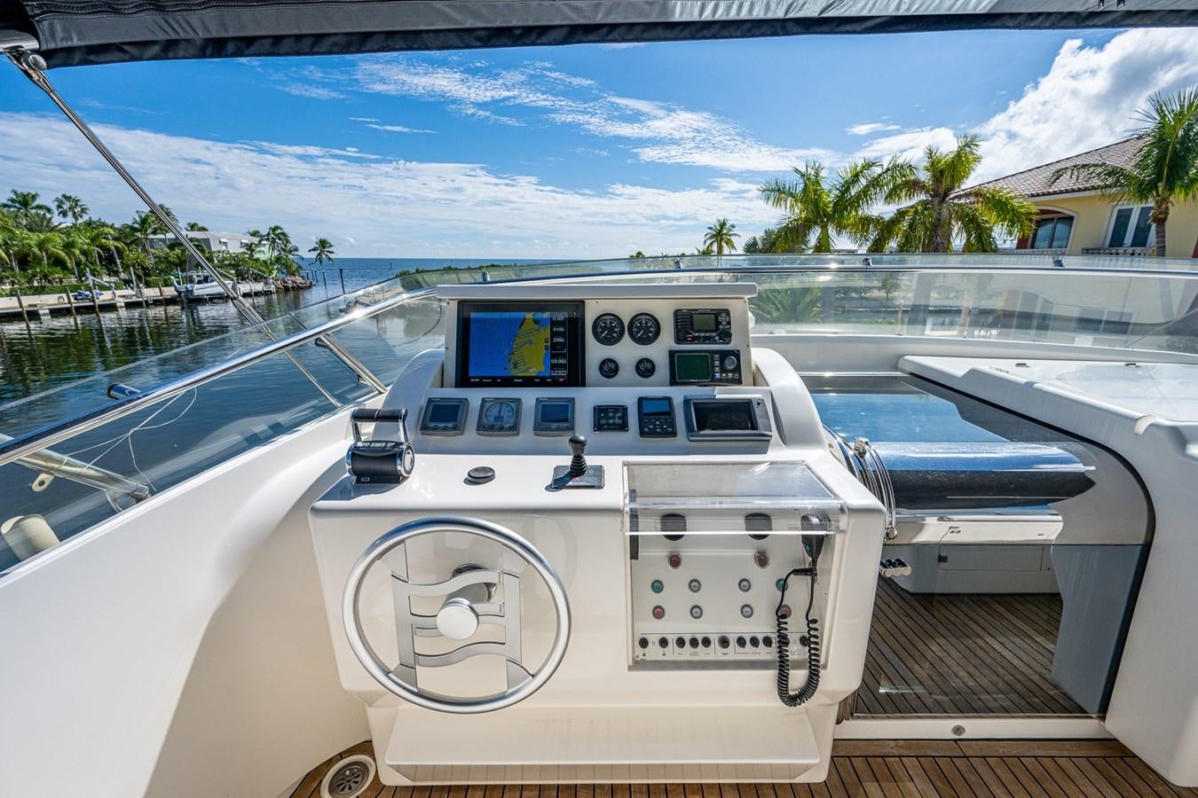 a white car on a boat aboard EVERYTHING GOOD Yacht for Sale