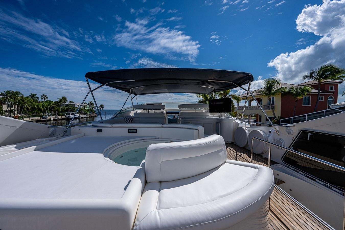 a boat docked at a pier aboard EVERYTHING GOOD Yacht for Sale